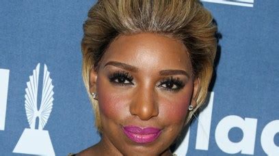 Breasts & Thighs, Oh My! NeNe Leakes Bares All In A Skimpy。